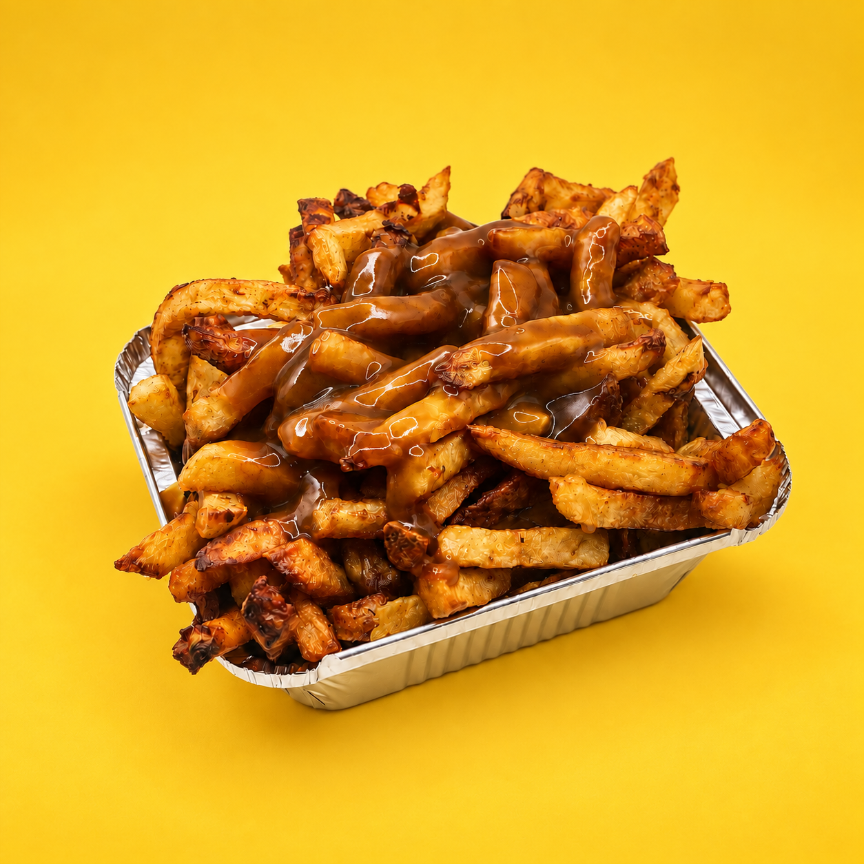 Poutine signature avec frites, sauce et fromage en grains